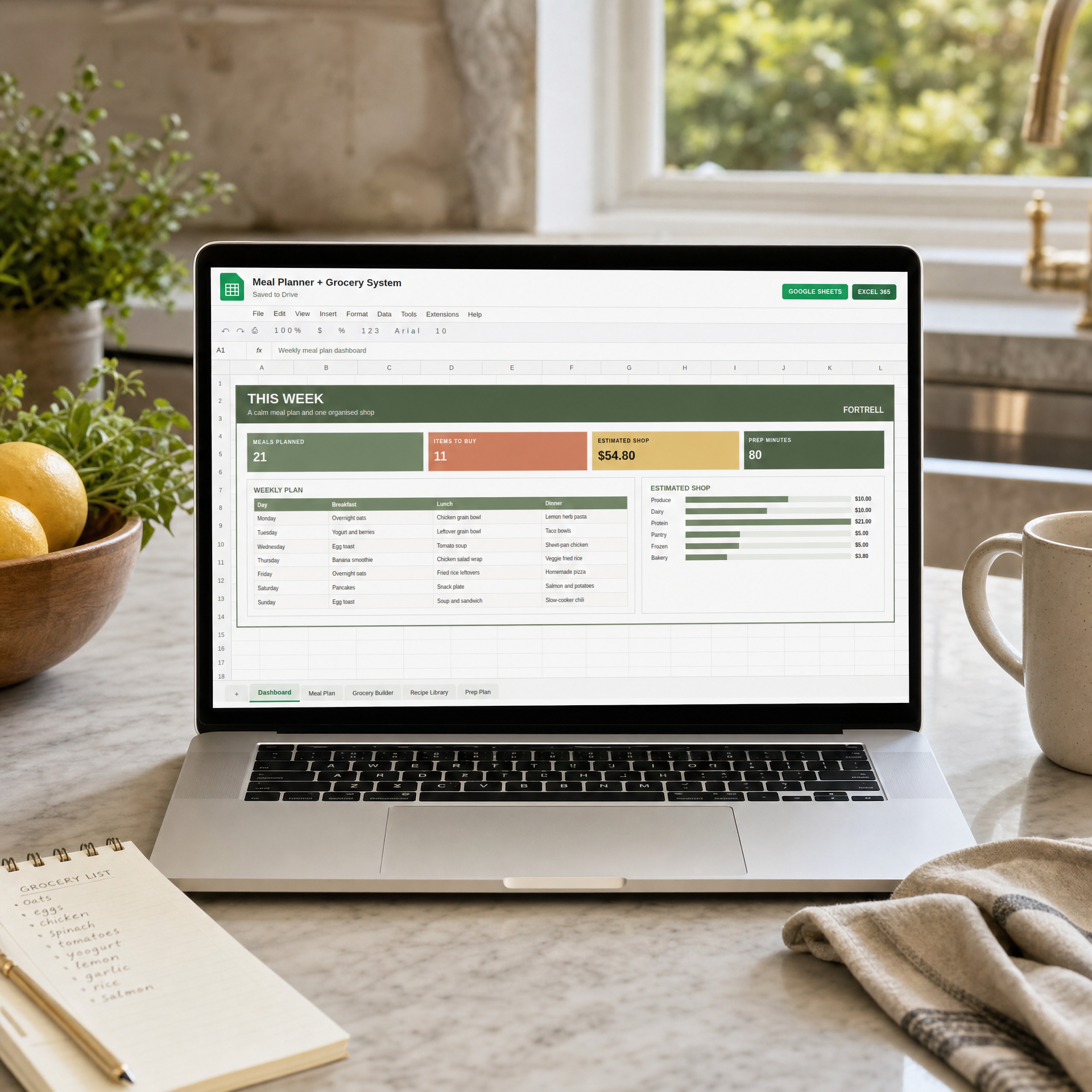 Meal Planner + Grocery System Google Sheets template in a bright kitchen workspace